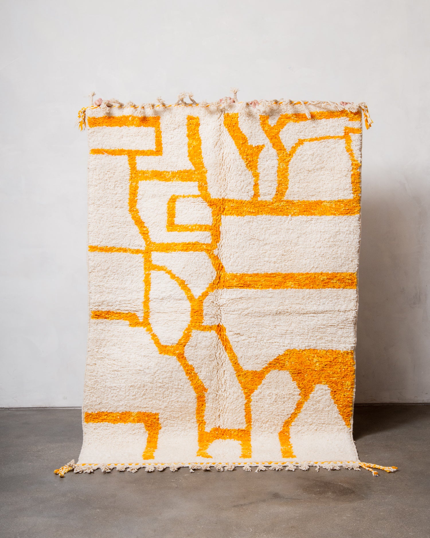 Modern, designer, handcrafted Berber rug from Morocco. Beniourain carpet with beautiful colours and patterns and fluffy wool texture.